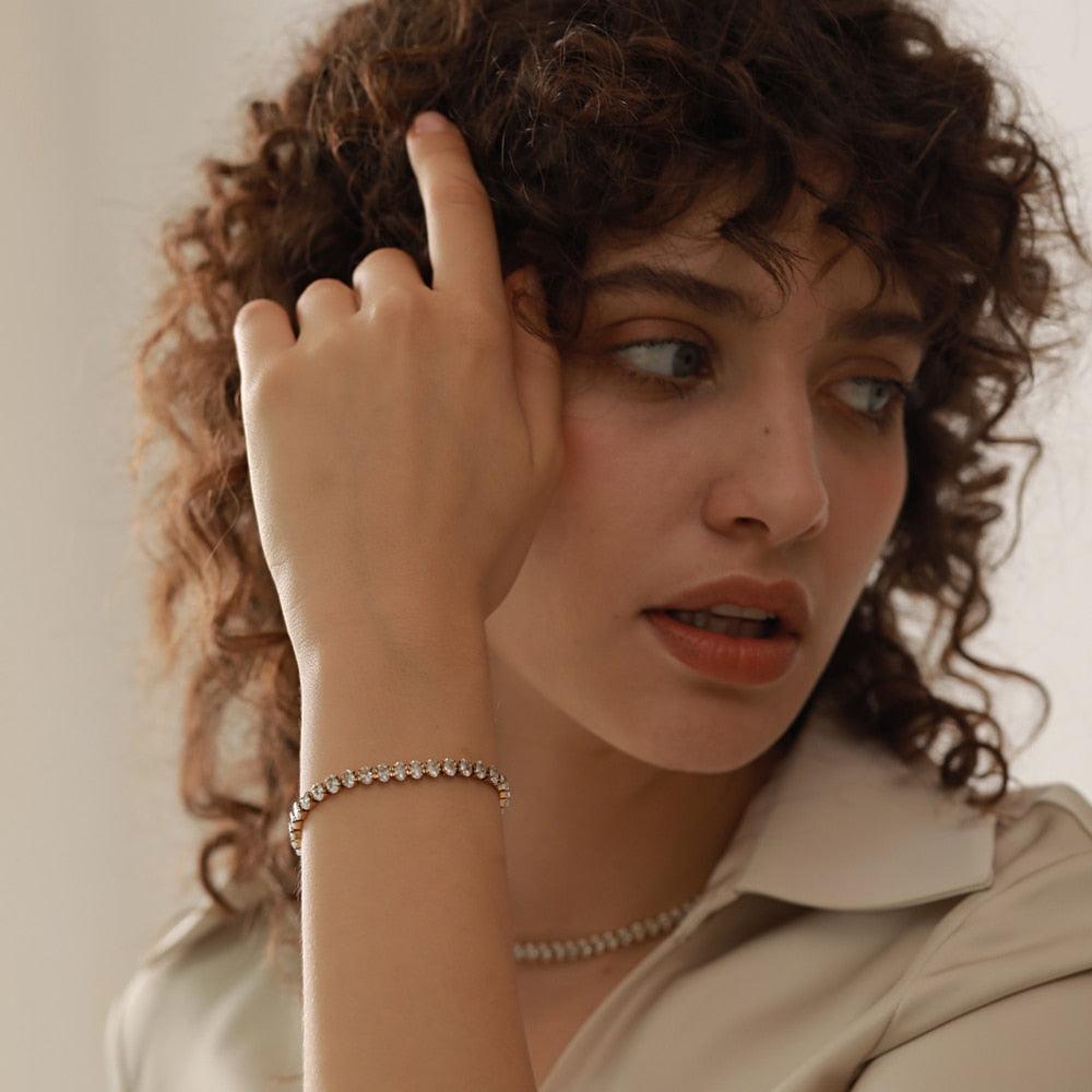 woman wearing tennis bracelet in silver